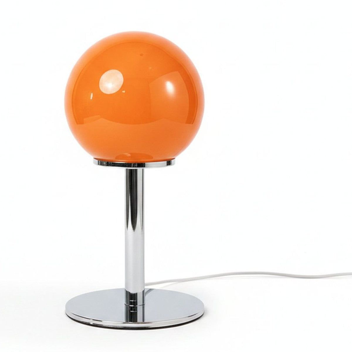 Lampe de bureau design Stellaria, packshot fond blanc, globe en verre orange sur pied chromé