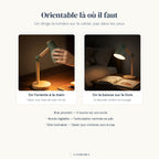 La lampe Boréal Candeora orientée à la main, puis baissée sur un livre