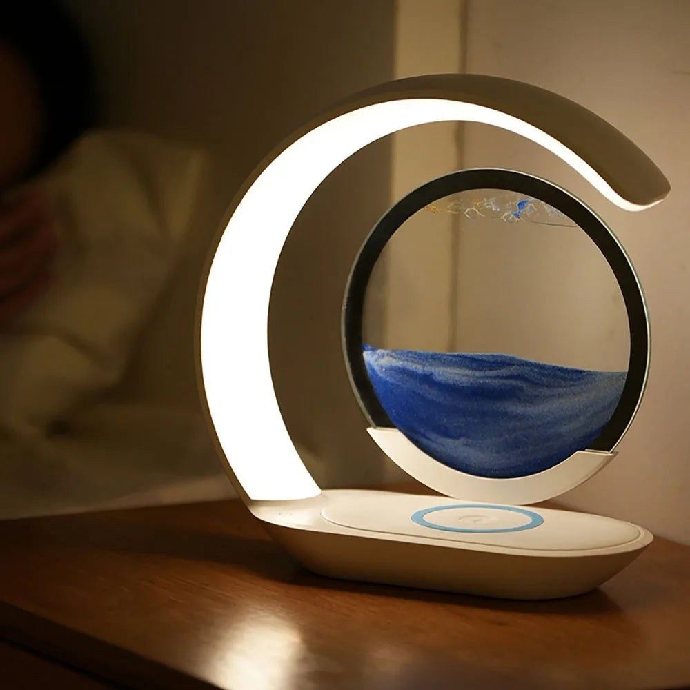 Lampe de bureau sans fil Sirocco Candeora allumée sur une table de chevet